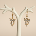 Bow earrings on correct holder