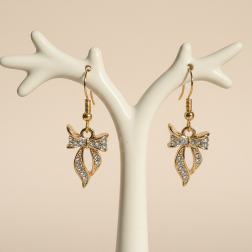 Bow earrings on correct holder