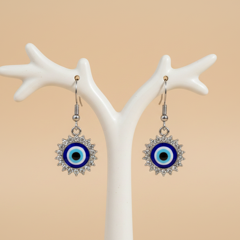 Evil Eye earrings on branch holder