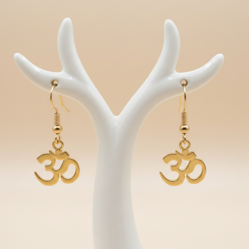 Om earrings on branch holder